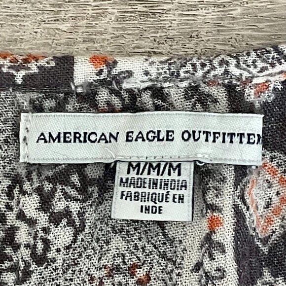 🌺 AEO American Eagle Outfitters Boho Navy Floral Cold-Shoulder Tassel Blouse M - Picture 5 of 7